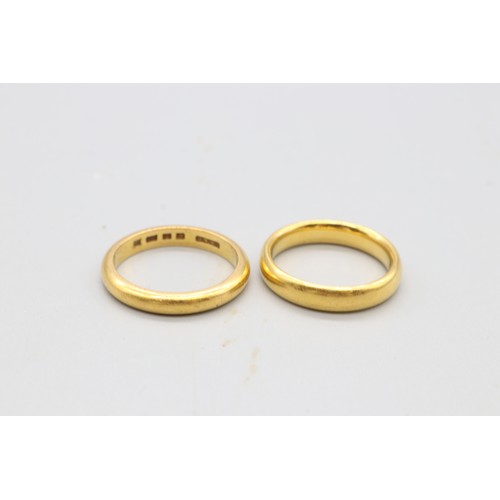 2 - Hallmarked 22ct yellow gold court wedding bands, comprising one 4mm court fit ring, size M, weight 6... 