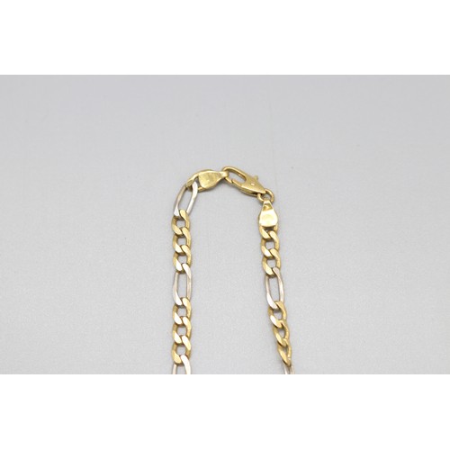 13 - A stamped 750 yellow and white gold two-tone solid Figaro link necklace chain, length approximately ... 