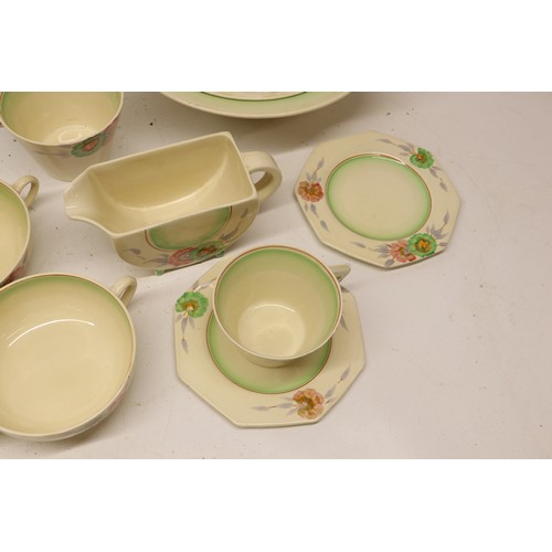 795 - Collection of Clarice Cliff tea and dinner ware, incl. honey pot, two teapots, teacups, soup cups, s... 