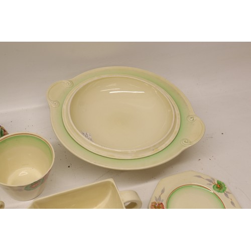 795 - Collection of Clarice Cliff tea and dinner ware, incl. honey pot, two teapots, teacups, soup cups, s... 