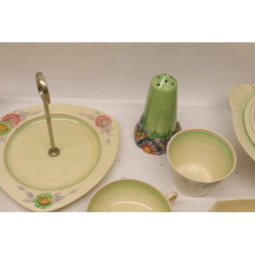 795 - Collection of Clarice Cliff tea and dinner ware, incl. honey pot, two teapots, teacups, soup cups, s... 