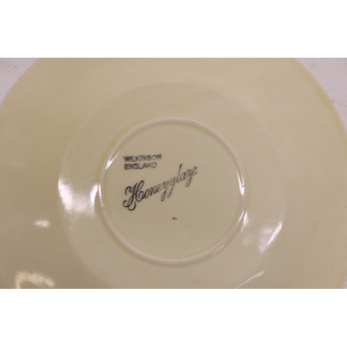 795 - Collection of Clarice Cliff tea and dinner ware, incl. honey pot, two teapots, teacups, soup cups, s... 