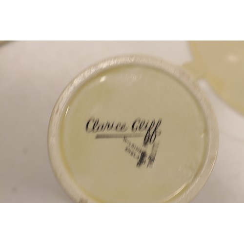 795 - Collection of Clarice Cliff tea and dinner ware, incl. honey pot, two teapots, teacups, soup cups, s... 