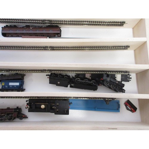 48 - Large assorted collection of N gauge diesel and steam locomotives, rolling stock and good wagons etc... 