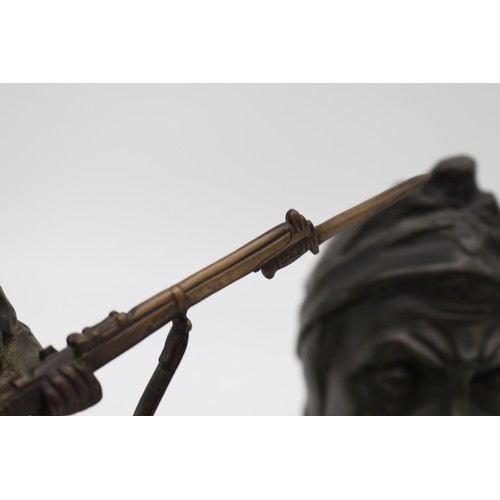 727 - Bronzes, cast bronze First World War soldier, hollow bronze 'dantes' bust, and bronze hand on on pli... 