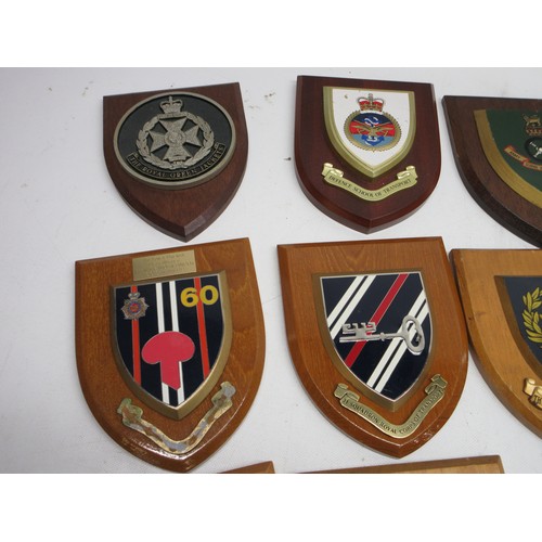 Sixteen military regimental plaques and a Guinness barometer. Mostly ...