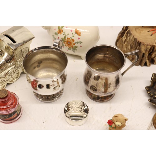 986 - Assorted collection of small decorative items, money boxes, figurines; incl. money box shaped as a e... 