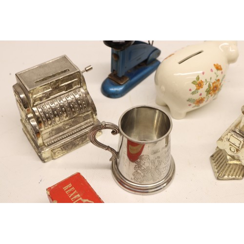 986 - Assorted collection of small decorative items, money boxes, figurines; incl. money box shaped as a e... 