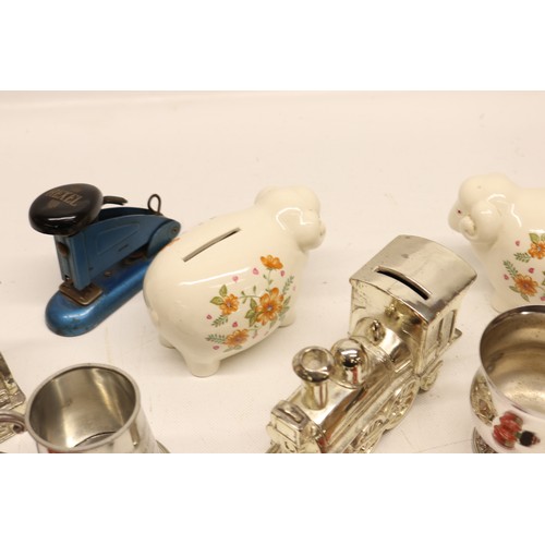 986 - Assorted collection of small decorative items, money boxes, figurines; incl. money box shaped as a e... 