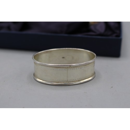  Boxed set of hallmarked silver napkin rings with zig zag borders, by Mark Houghton Ltd, Sheffield 20... 