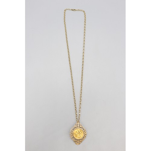  Hallmarked 9ct yellow gold scrollwork open pendant with mounted 1925 George V gold sovereign on a 24... 