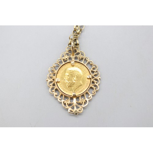  Hallmarked 9ct yellow gold scrollwork open pendant with mounted 1925 George V gold sovereign on a 24... 