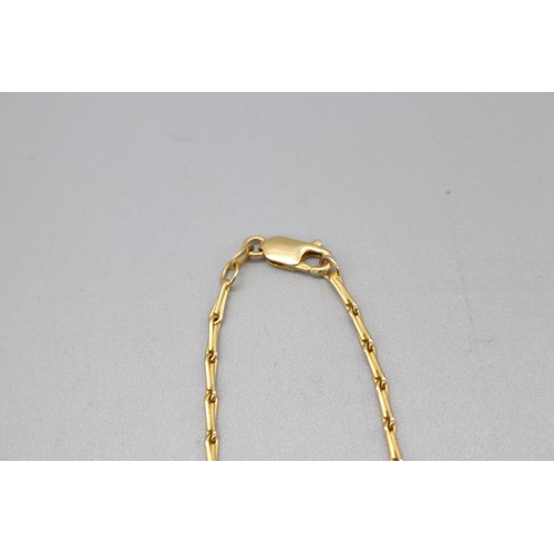 5 - A hallmarked 9ct yellow gold ruby and diamond locket on a hallmarked 9ct yellow gold barleycorn link... 