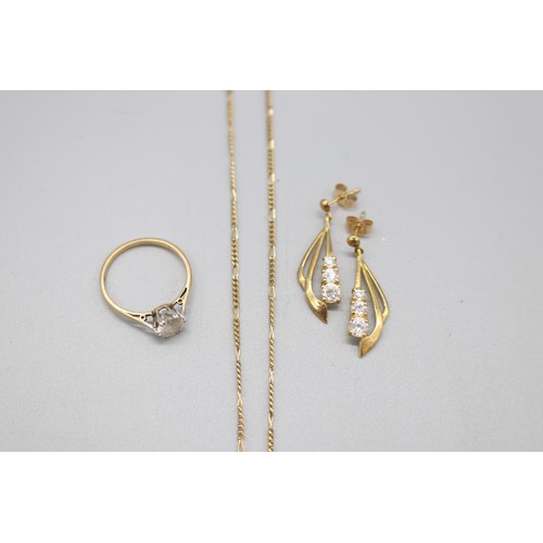 21 - A lot of hallmarked 9ct yellow gold cubic zirconia jewellery, comprising a stamped 9ct yellow gold s... 