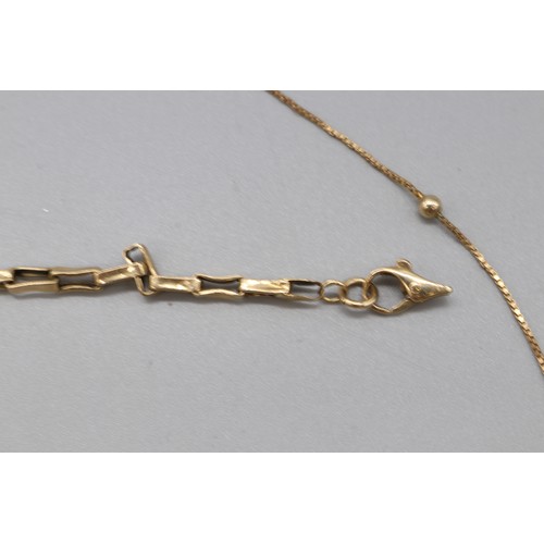 26 - A lot of hallmarked 9ct yellow gold jewellery, comprising a hallmarked 9ct yellow gold box link brac... 