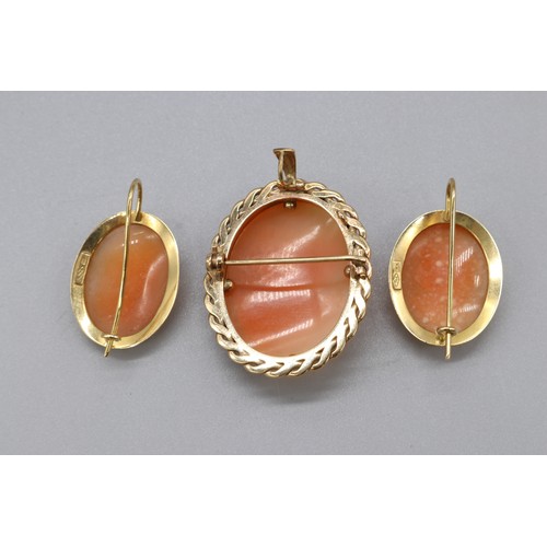 28 - Shell cameo jewellery, comprising a pair of hallmarked 9ct yellow gold cameo earrings (5.43g), and a... 
