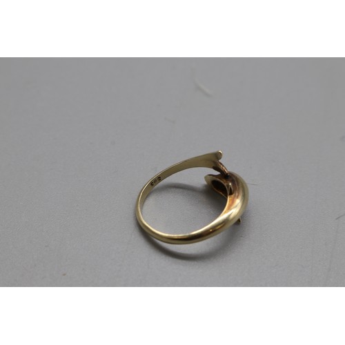 22 - Stamped 14ct yellow gold dolphin torque bangle and matching expandable ring size N (aprox) combined ... 