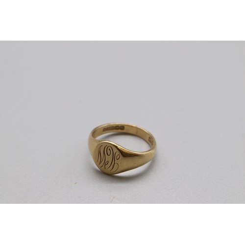 29 - A lot of three hallmarked 9ct yellow gold signet rings, comprising an oval head signet engraved “JCW... 