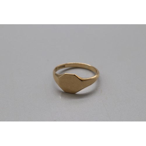 29 - A lot of three hallmarked 9ct yellow gold signet rings, comprising an oval head signet engraved “JCW... 