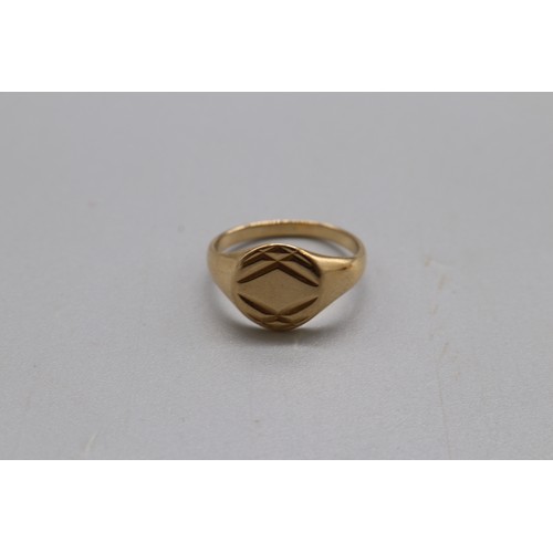 29 - A lot of three hallmarked 9ct yellow gold signet rings, comprising an oval head signet engraved “JCW... 