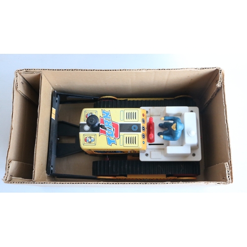 Three vintage boxed bulldozer models to include small scale tinplate ...