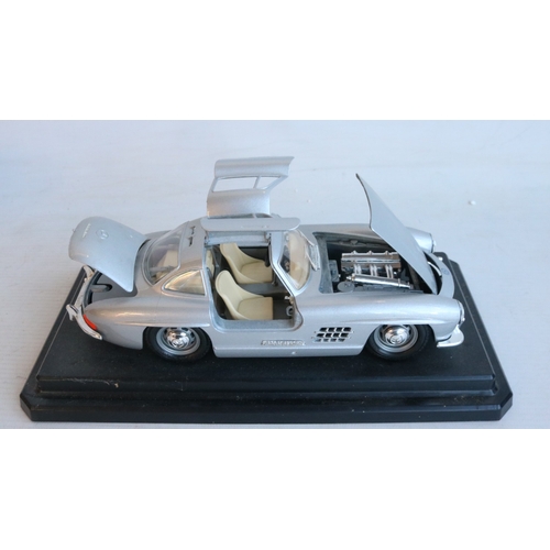 Mixed collection of boxed and unboxed car and vehicle models, various ...