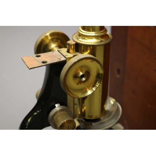 J. Swift & Son, London, 'Research' japanned and brass microscope with ...