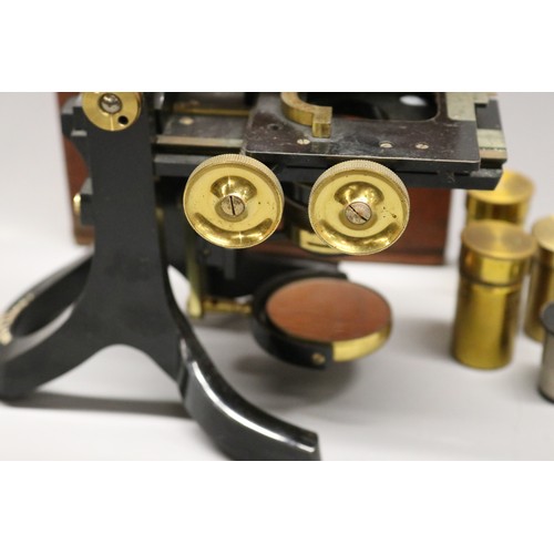 J. Swift & Son, London, 'Research' japanned and brass microscope with ...