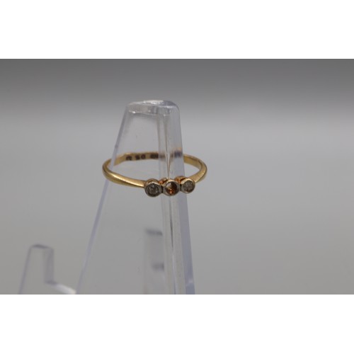 41 - Mixed gold jewellery, comprising a hallmarked 18ct yellow gold diamond trilogy ring, size O, the cen... 