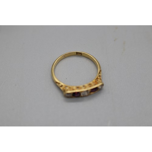 49 - Stamped 18ct yellow gold amethyst and diamond five-stone ring, with filigree setting, set with two c... 