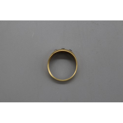 48 - 18ct yellow gold diamond three-stone band ring (marks illegible, XRF tested as 18ct), ring size M, w... 