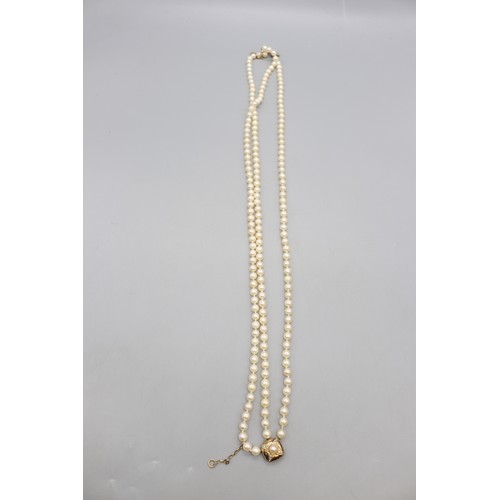 45 - Mixed lot of gold-mounted pearl jewellery, comprising a hallmarked 9ct yellow gold multi-strand pear... 