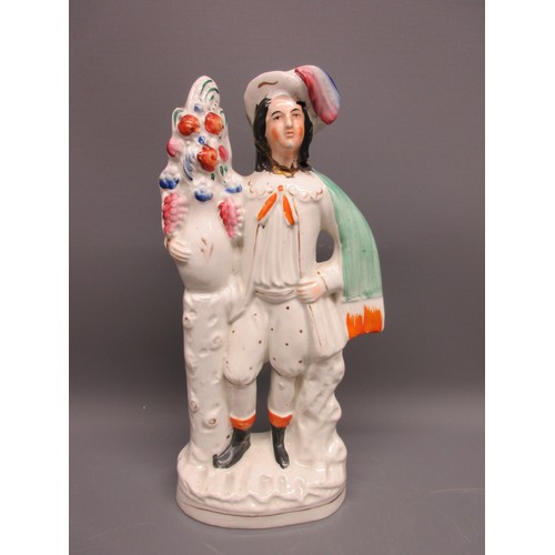 648 - Three Staffordshire ware spill vases; Little Red Riding Hood with Wolf, Gentleman with flowers, and ... 