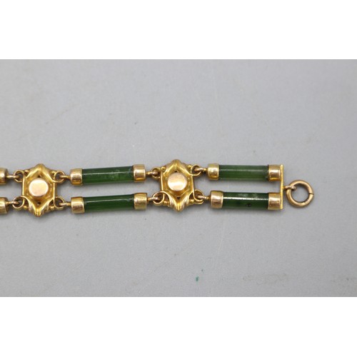 50 - The Janet Ellis Collection - Stamped 9ct yellow gold and jade bracelet, comprising five decorative g... 