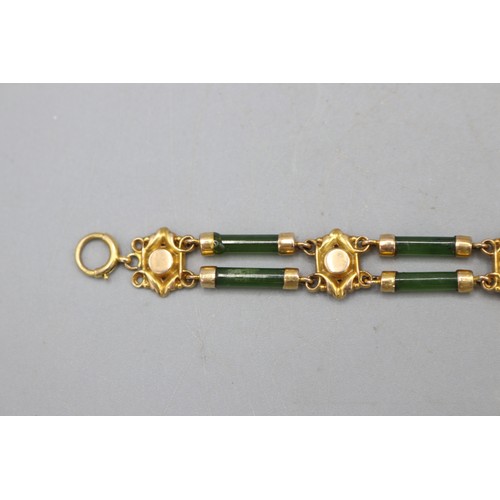 50 - The Janet Ellis Collection - Stamped 9ct yellow gold and jade bracelet, comprising five decorative g... 