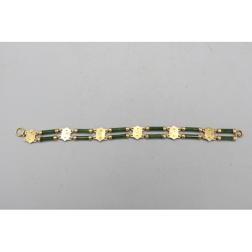 50 - The Janet Ellis Collection - Stamped 9ct yellow gold and jade bracelet, comprising five decorative g... 