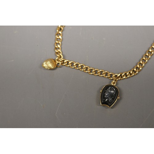 1 - 18ct yellow gold charm bracelet, Eastern stamped and XRF tested, comprising a solid curb link bracel... 