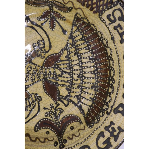 Late 19th century slipware charger, Toft Style, with central female ...