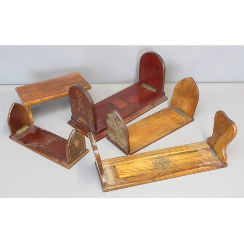 Small collection of 4 wood book slides and a small folding wood stand ...