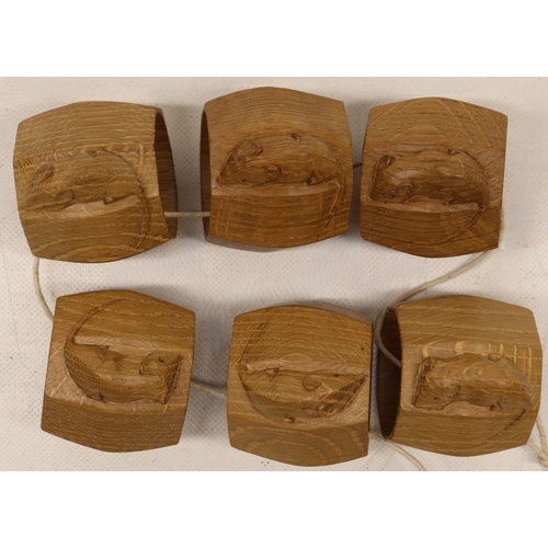  Robert Mouseman Thompson of Kilburn - a set of six oak octagonal napkin rings, carved with signature... 