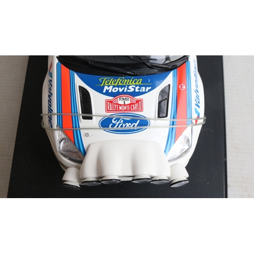 49 - Two 1/18th scale diecast WRC model cars from AutoArt to include 89992 1999 Subaru Impreza #5 Burns/R... 