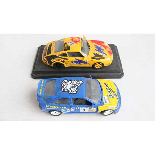 56 - Collection of 1/18 and 1/24 scale racing car models to include 5x boxed examples including 2x Merced... 