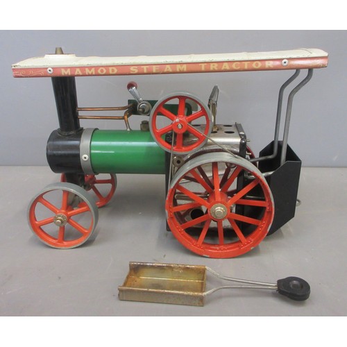 4 - One Mamod T.E.1a live steam tractor in previously used though good condition with funnel and steerin... 