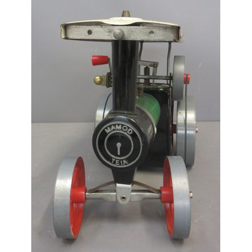 4 - One Mamod T.E.1a live steam tractor in previously used though good condition with funnel and steerin... 