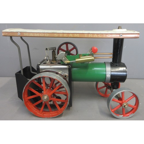 4 - One Mamod T.E.1a live steam tractor in previously used though good condition with funnel and steerin... 