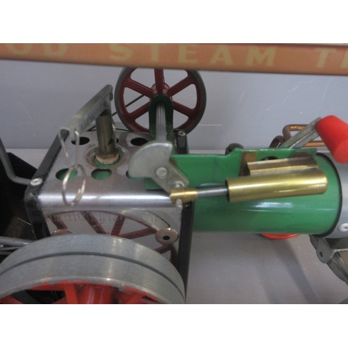 4 - One Mamod T.E.1a live steam tractor in previously used though good condition with funnel and steerin... 