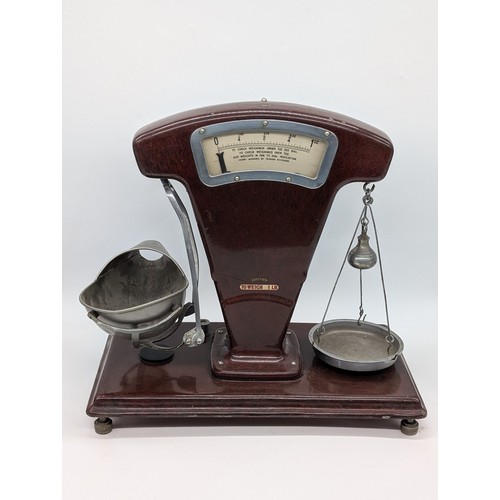 Set of circa 1930s sweet shop style scales; art deco style in faux Bakelite painted finish; fan shap... 