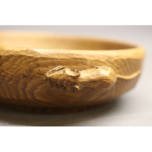 Robert Mouseman Thompson of Kilburn - an oak circular nut bowl, tooled interior and carved with signature exterior mouse, D16.5cm
Bradleys Shipping £35.00 plus vat (UK Only)