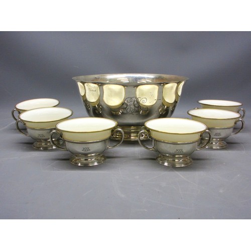 Tiffany & Co serving set comprising sterling silver bowl, model no.22967, approx. D26cm x H13cm, accompanied by 6 twin-handled bowl covers; 925-1000 stamped, approx. 56.5ozt gross; with Lenox bone china bouillon liners, in cream with gilt rims, (7)
Bradleys Shipping £50.00 plus vat (UK Only)