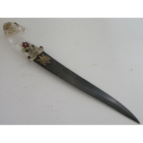 Indo-Persian Khanjar with mughal 'pistol' shaped translucent crystal hilt with ram head, embellished with foiled coloured glass or pastes, the curved blade is likely of a later date and is decorated with leaf motif in golf koftgari Blade L28cm, overall L39cm
Bradleys Shipping £35.00 plus vat (UK Only)